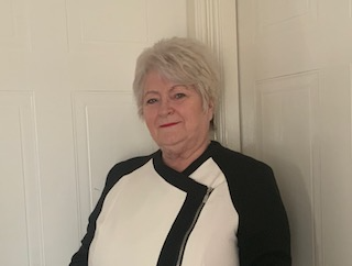 a headshot of Suzanna Walker, compliance consultant at Compliance4u